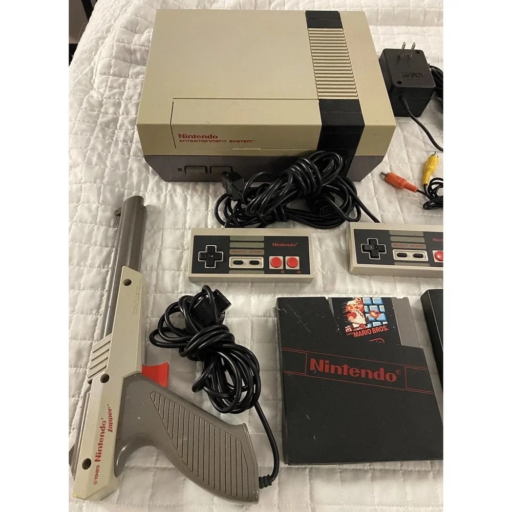 authentic NES Console Bundle with Super Mario Bros. 1,2,3 and 2 Controllers gun